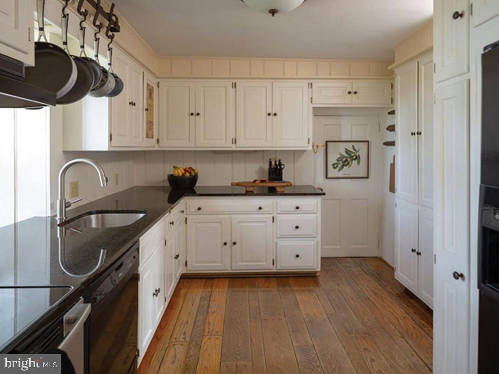 1375 Chestnut Tree Road Honey Brook, PA 19344 - Photo 2 of 15 a kitchen with stainless steel appliances a stove a sink a refrigerator and cabinets