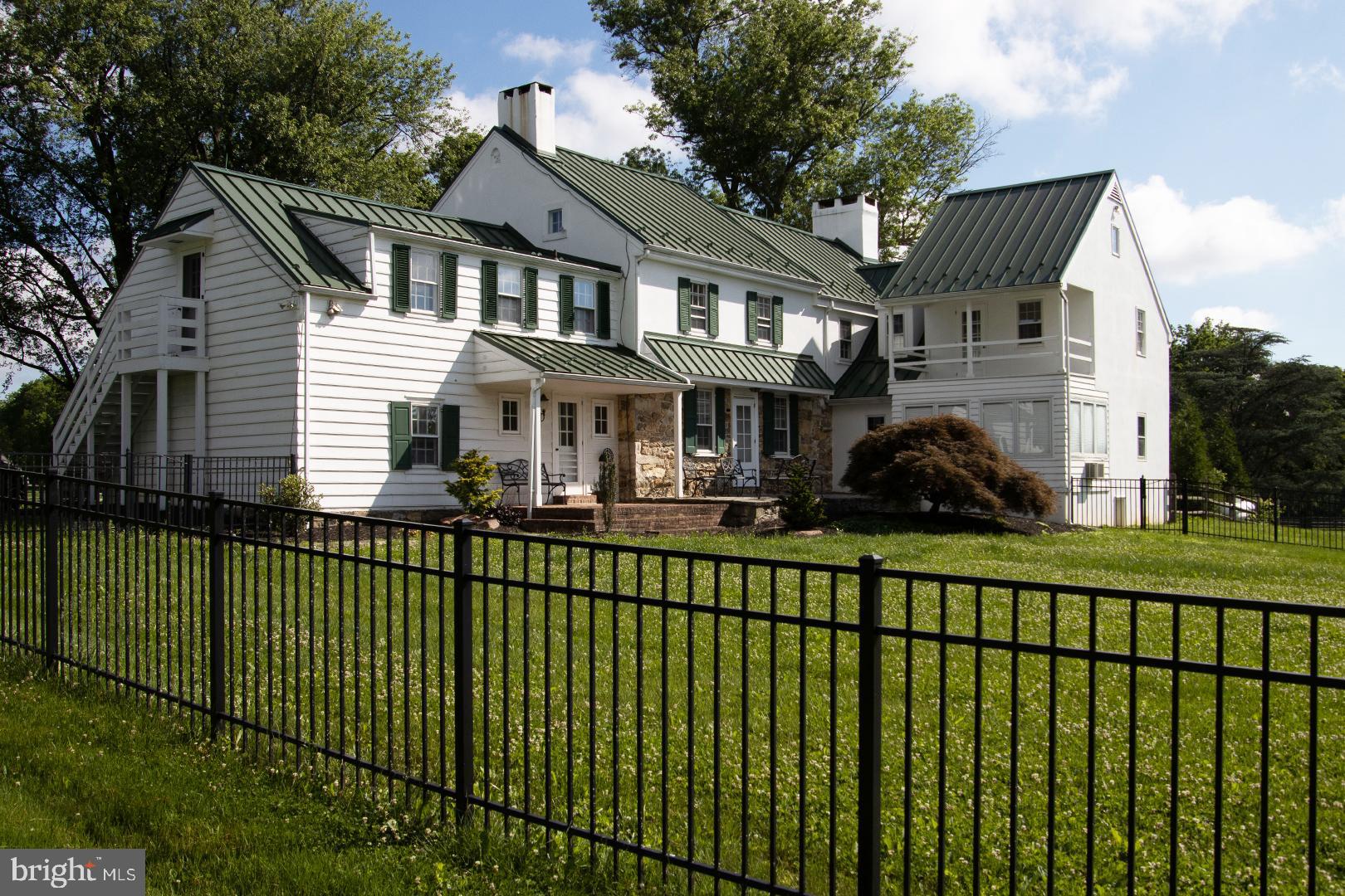 1375 Chestnut Tree Road Honey Brook, PA 19344 - Photo 15 of 15 a front view of a house with a garden