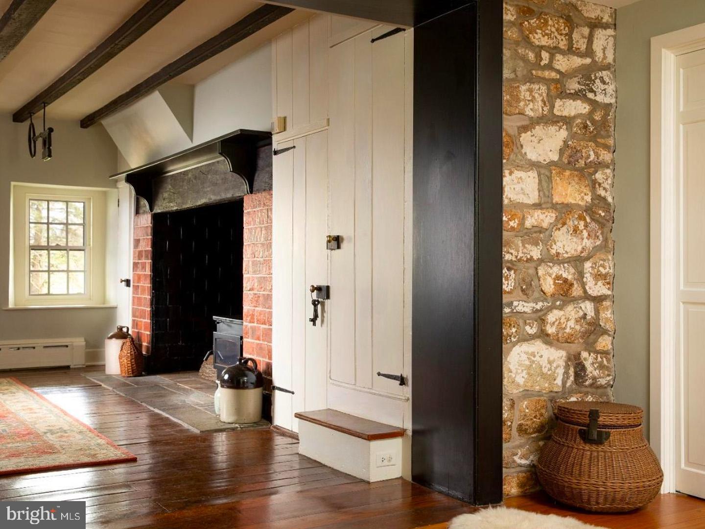1375 Chestnut Tree Road Honey Brook, PA 19344 - Photo 7 of 15 a view of an entryway with wooden floor and windows