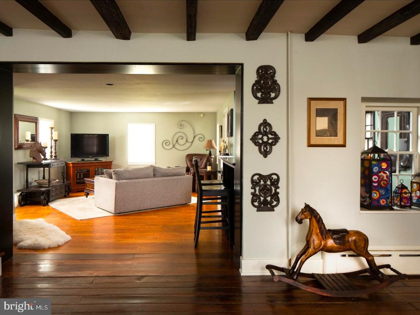 1375 Chestnut Tree Road Honey Brook, PA 19344 - Photo 8 of 15 a living room with furniture and wooden floor