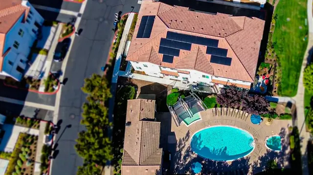 aerial view of a house with a swimming pool