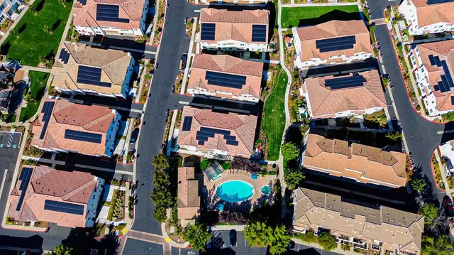 an aerial view of multi story residential apartment building