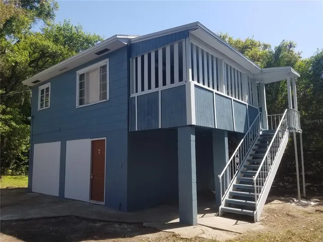 a view of a house with a deck