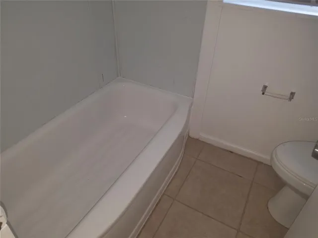 a bathroom with a sink and toilet