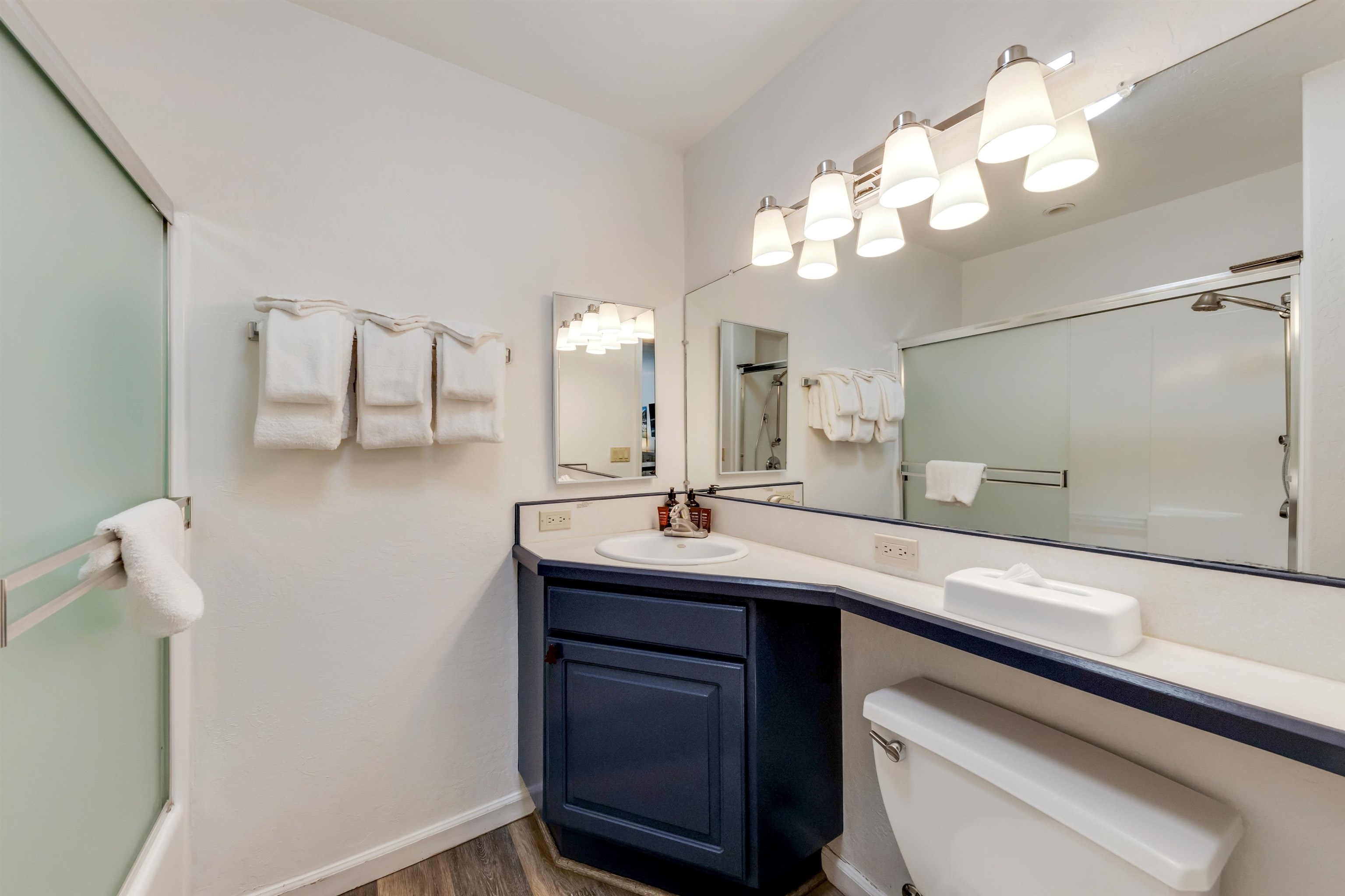 2000 North Village Drive, Unit 234 Truckee, CA 96161 - Photo 6 of 27 a bathroom with a sink a large mirror and vanity