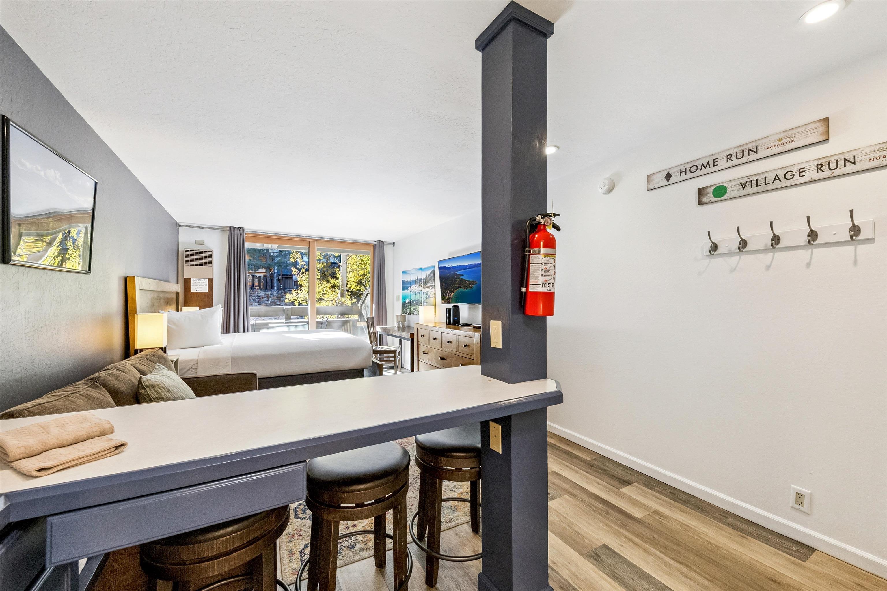 2000 North Village Drive, Unit 234 Truckee, CA 96161 - Photo 7 of 27 a living room with furniture and a flat screen tv