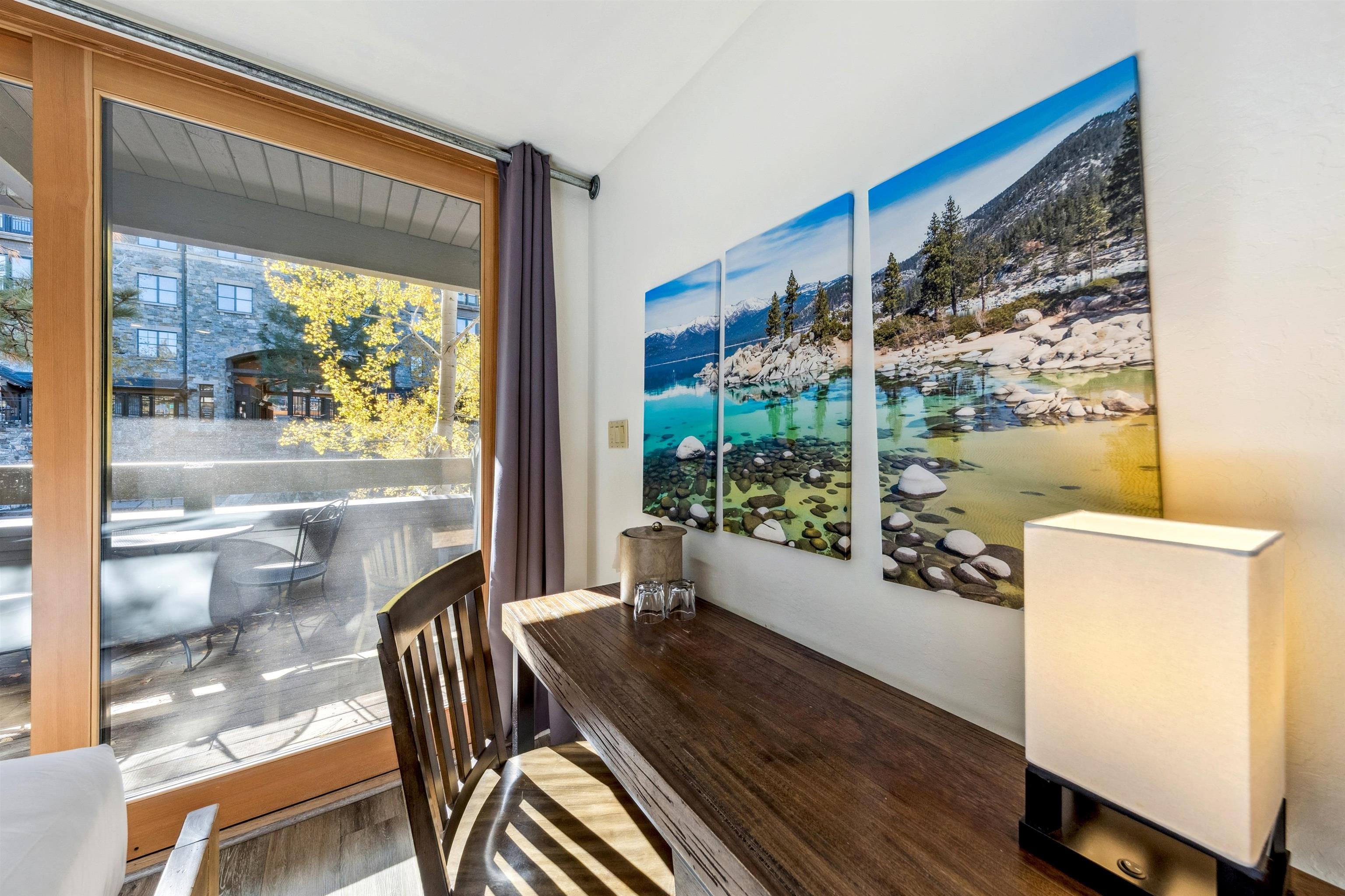2000 North Village Drive, Unit 234 Truckee, CA 96161 - Photo 10 of 27 a view of a dining room with furniture window and wooden floor
