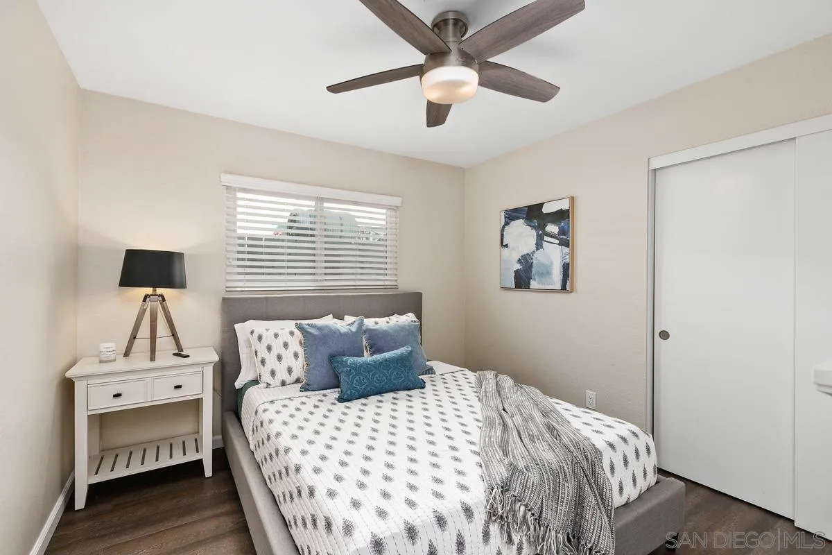 644 Silver Strand Boulevard Imperial Beach, CA 91932 - Photo 13 of 19 a bedroom with a bed and a window