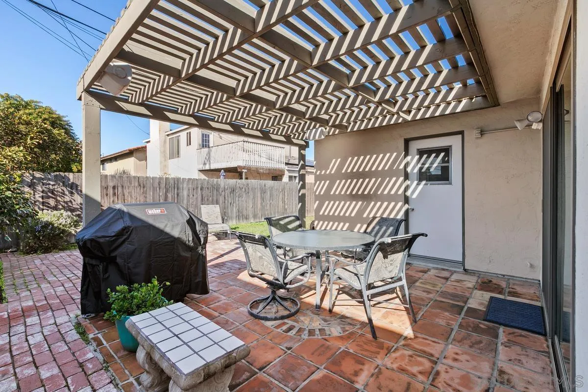 644 Silver Strand Boulevard Imperial Beach, CA 91932 - Photo 17 of 19 a patio with table and chairs