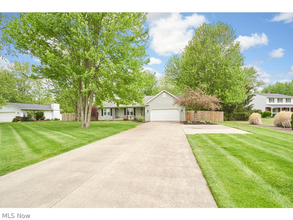 41780 Parsons Road Lagrange, OH 44050 - Photo 21 of 21 View of front of property with a garage and a front lawn