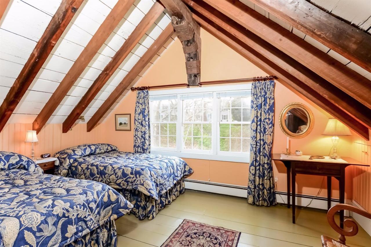 38 Bridge Street Chatham, MA 02633 - Photo 24 of 28 a bedroom with two beds and a large window