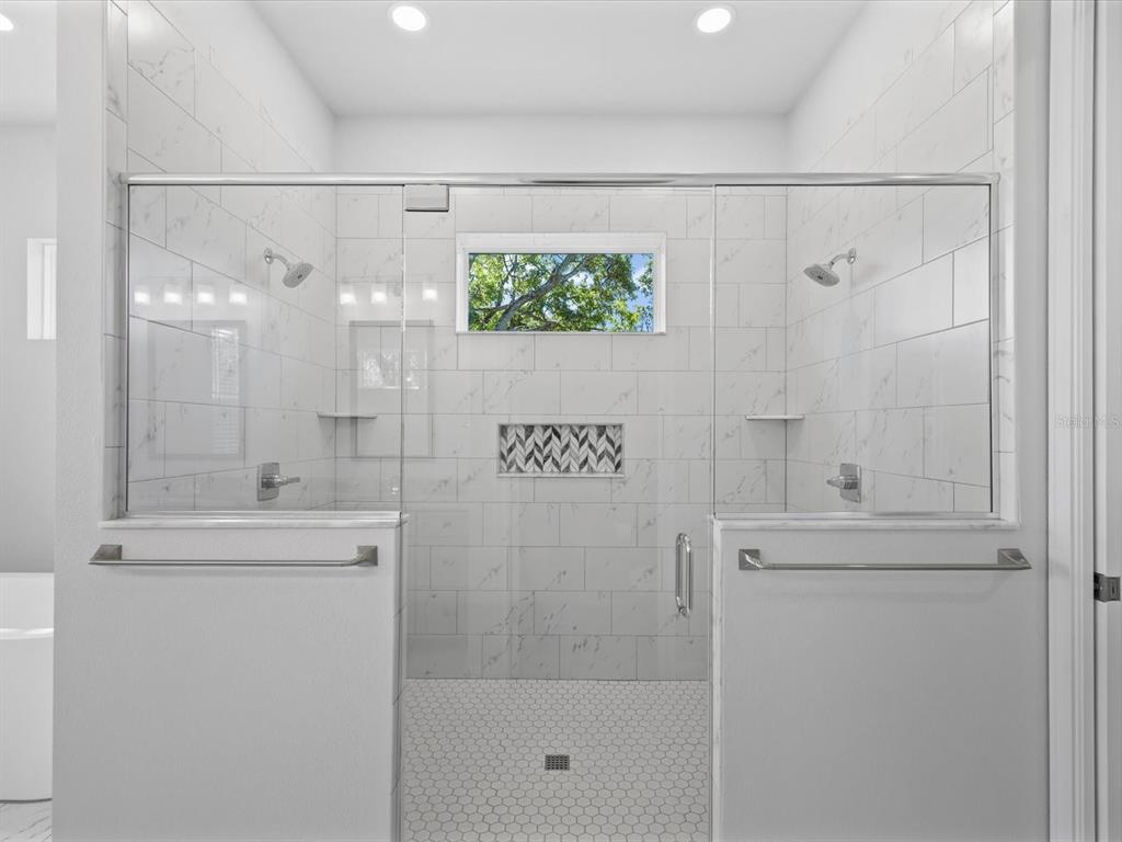 11981 Robina Road Weeki Wachee, FL 34614 - Photo 26 of 93 a bathroom with a shower and a sink