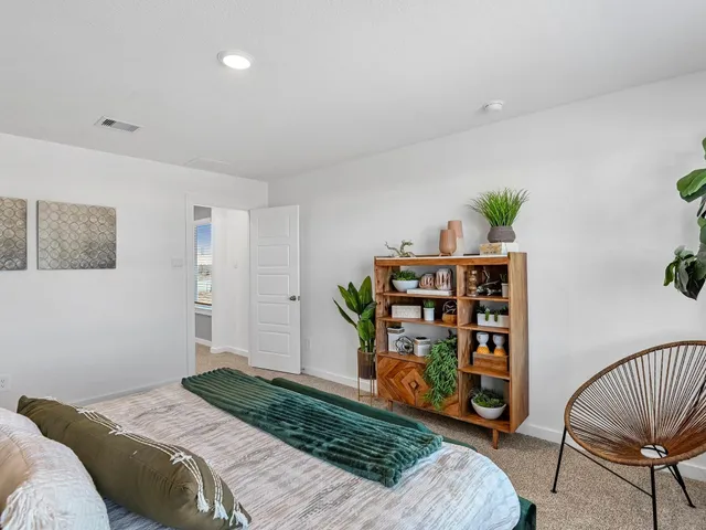 a view of an empty room with a hallway