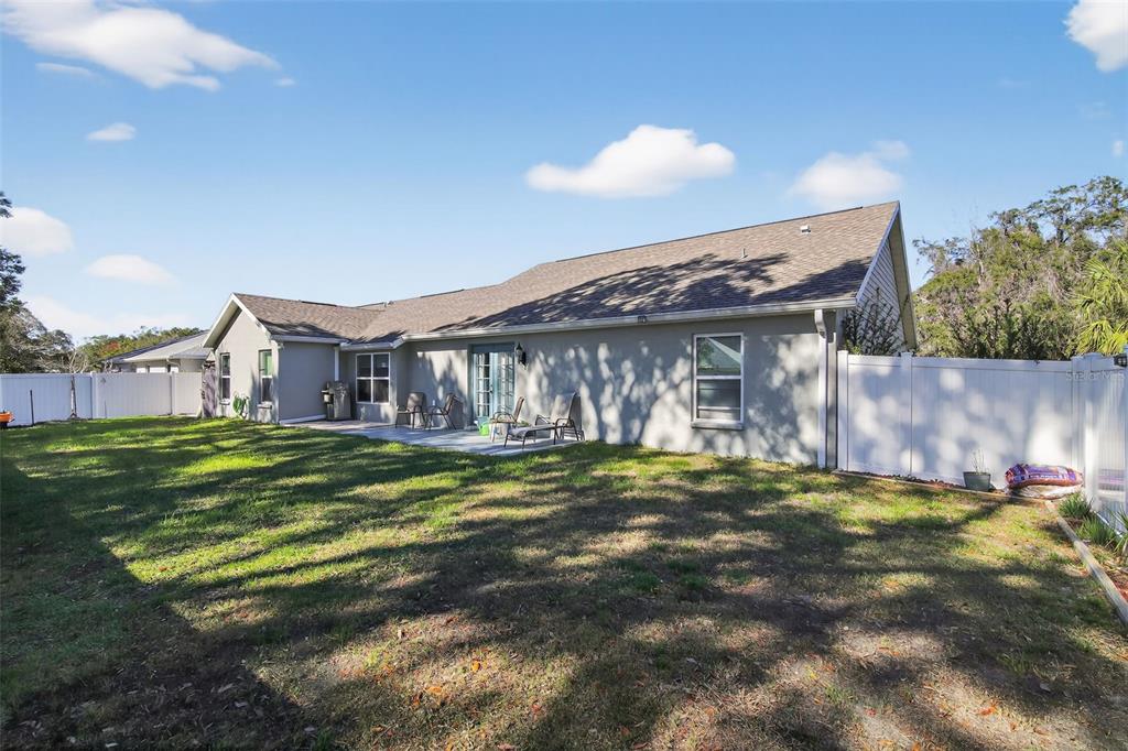 6732 Southwest 109th Lane Ocala, FL 34476 - Photo 3 of 20 a view of a house with a yard