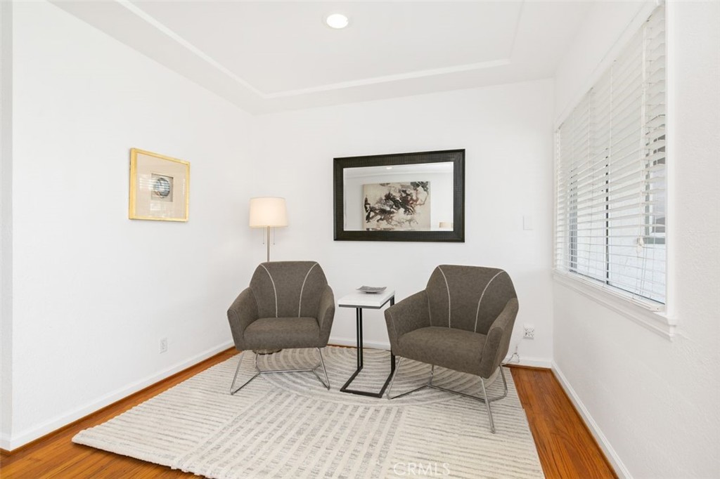 3208 West 152nd Place Gardena, CA 90249 - Photo 8 of 35 a living room with furniture and a window