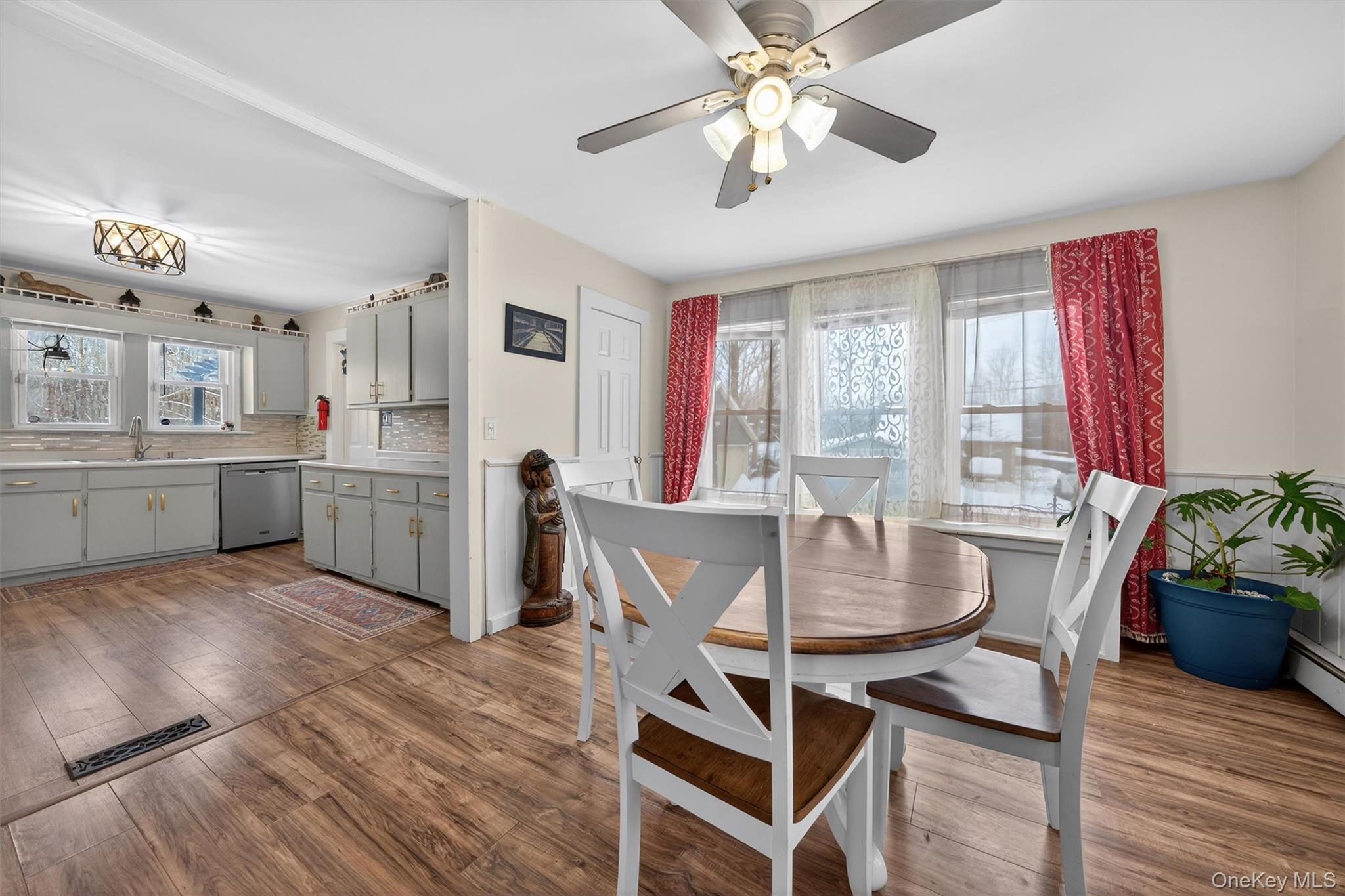 506 Plattekill Ardonia Road Wallkill, NY 12589 - Photo 16 of 44 a view of a dining room with furniture window and wooden floor