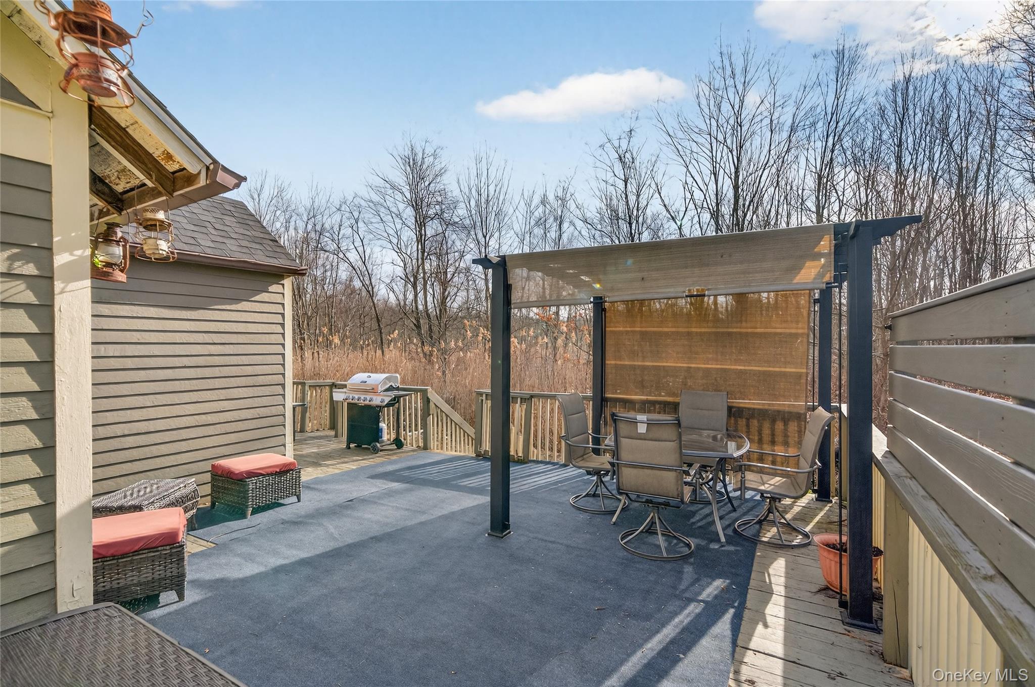 506 Plattekill Ardonia Road Wallkill, NY 12589 - Photo 38 of 44 a view of a patio with a table and chairs and potted plants