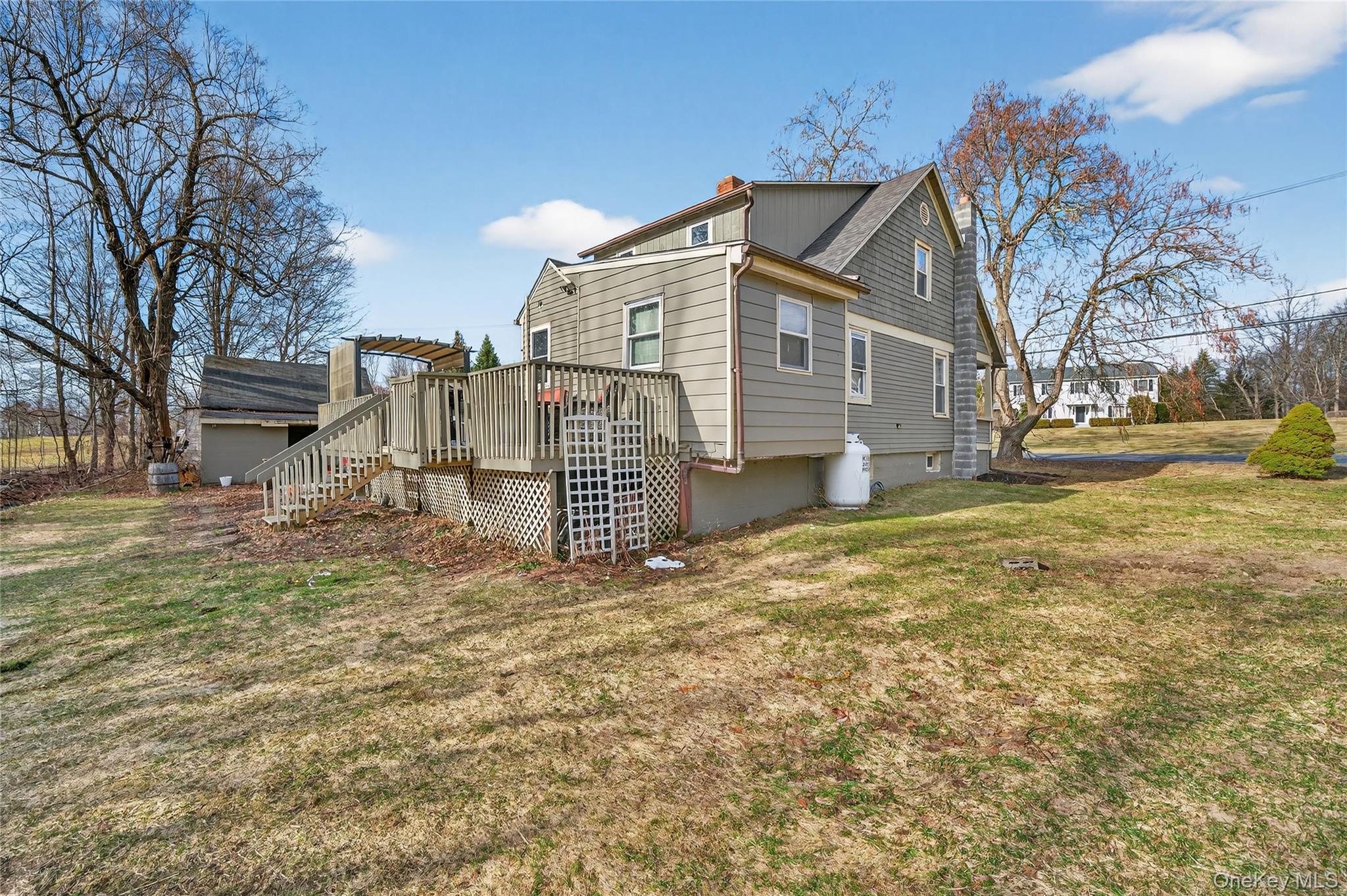 506 Plattekill Ardonia Road Wallkill, NY 12589 - Photo 42 of 44 a view of a house with a yard covered with snow