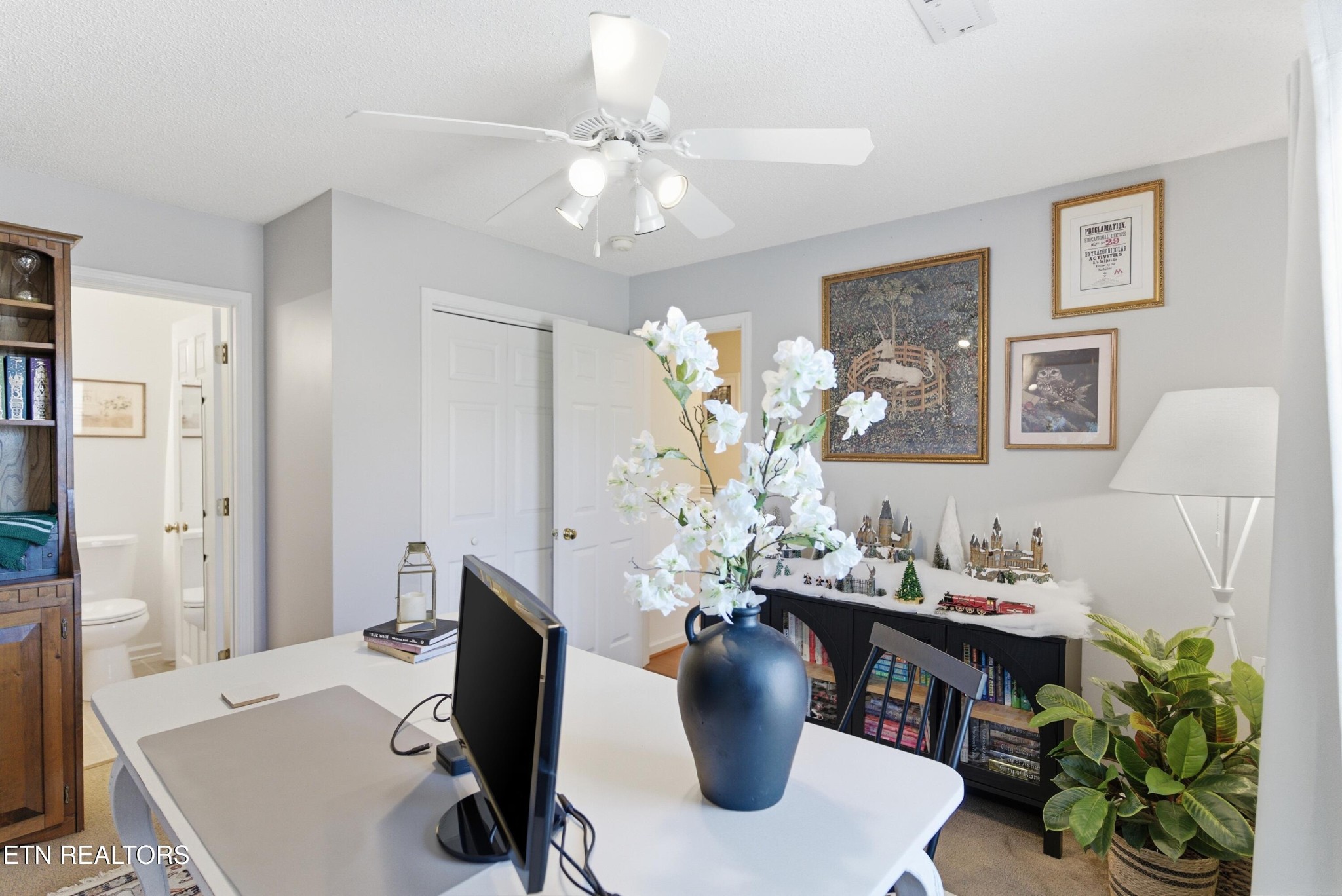 8009 Chambord Way Powell, TN 37849 - Photo 23 of 32 a dining room with furniture and wooden floor