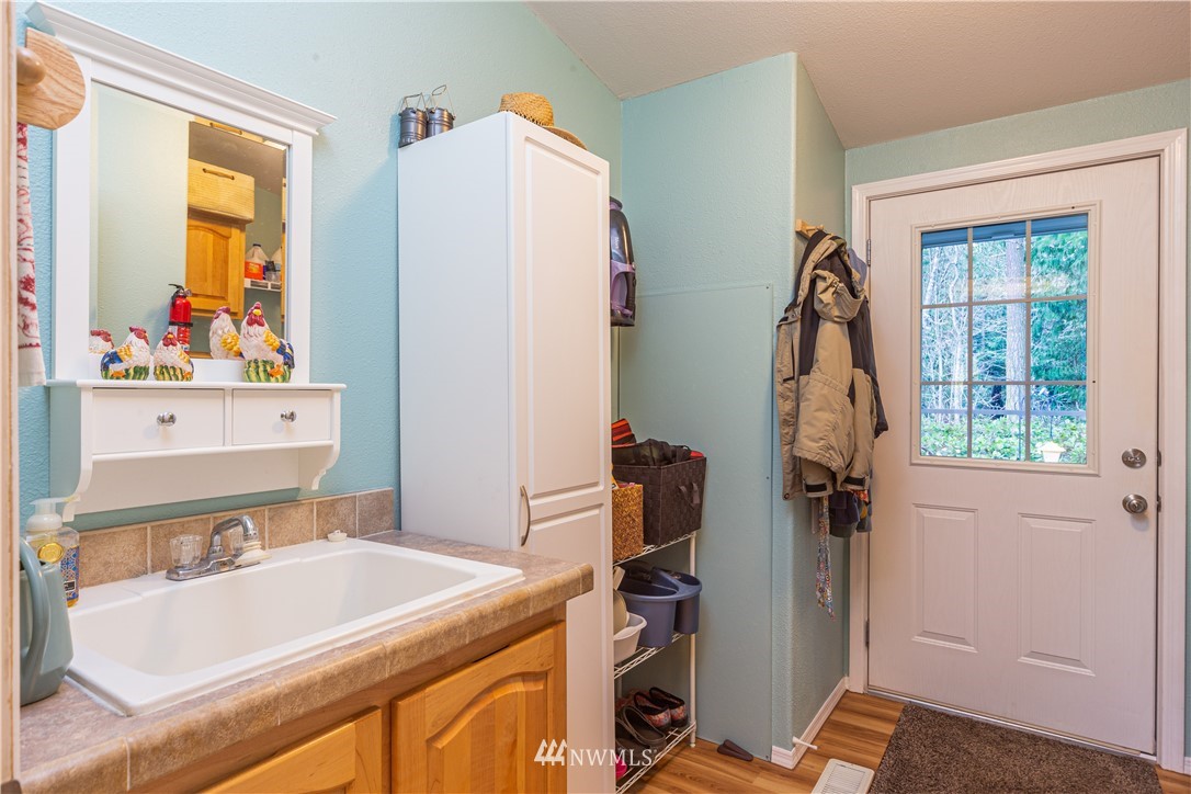 364 Port Hadlock Heights Road Port Hadlock, WA 98339 - Photo 21 of 30 a bathroom with a sink and a tub