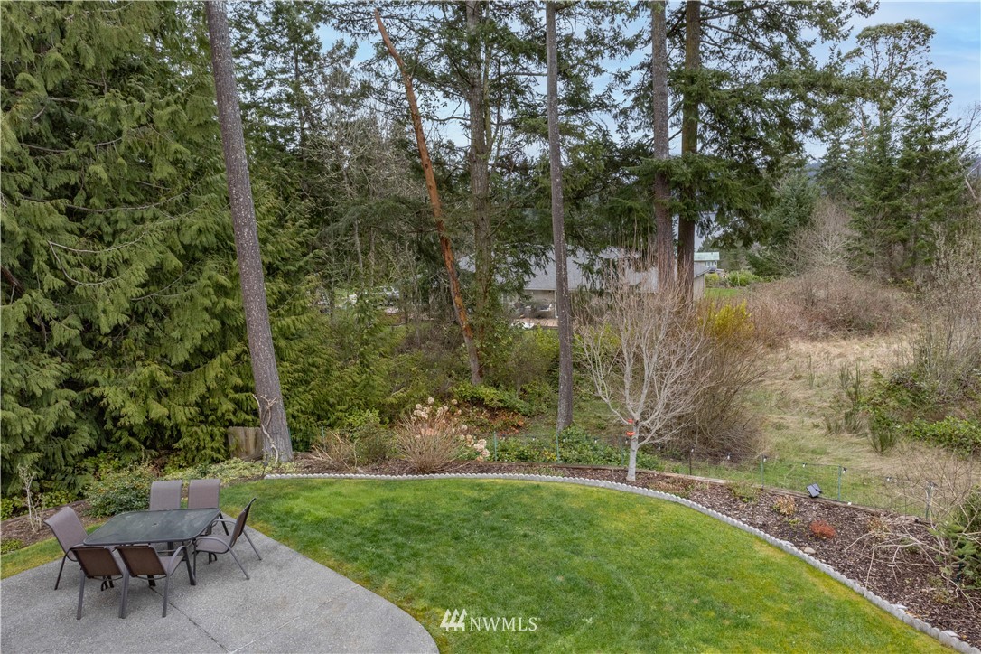 364 Port Hadlock Heights Road Port Hadlock, WA 98339 - Photo 28 of 30 a view of a chair and table in the garden