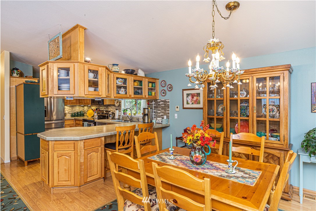 364 Port Hadlock Heights Road Port Hadlock, WA 98339 - Photo 10 of 30 a very nice looking dining room with a table and chairs