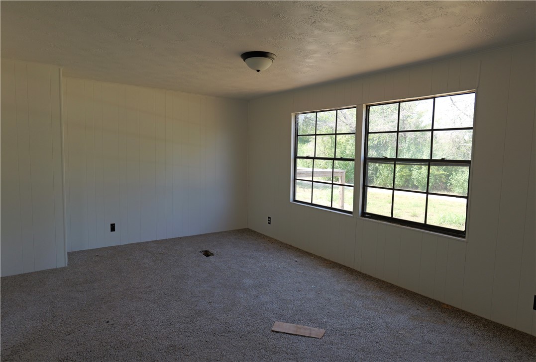 732 F Rogers Street Normangee, TX 77871 - Photo 7 of 8 an empty room with a window