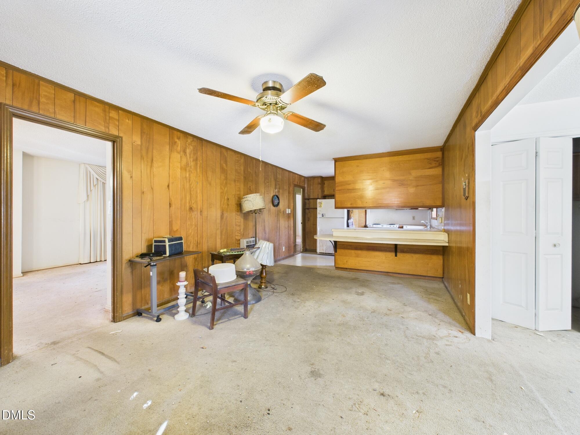 1012 Akron Avenue Durham, NC 27713 - Photo 15 of 43 a view of a livingroom with furniture and a ceiling fan