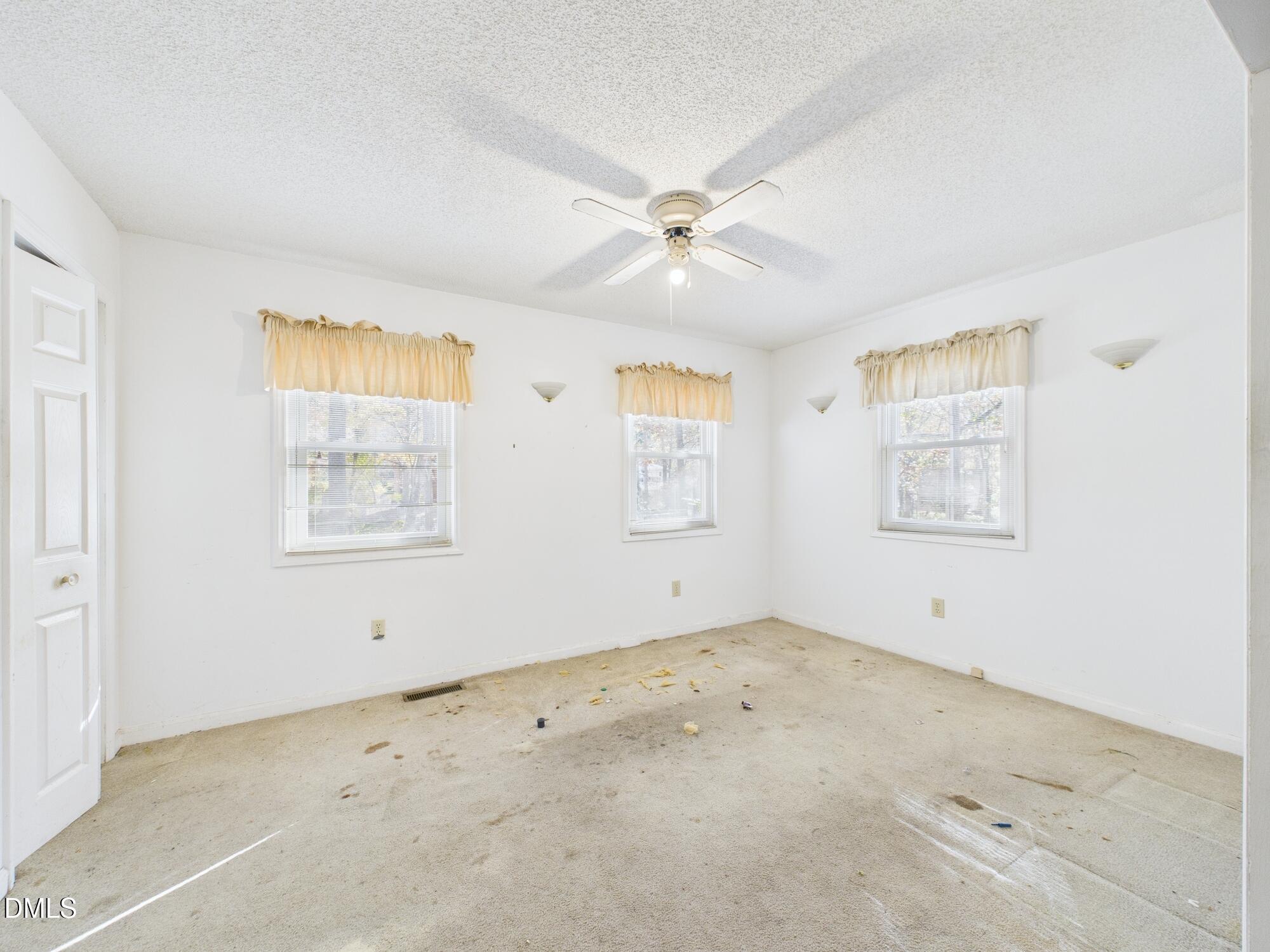 1012 Akron Avenue Durham, NC 27713 - Photo 16 of 43 a view of an empty room with a window
