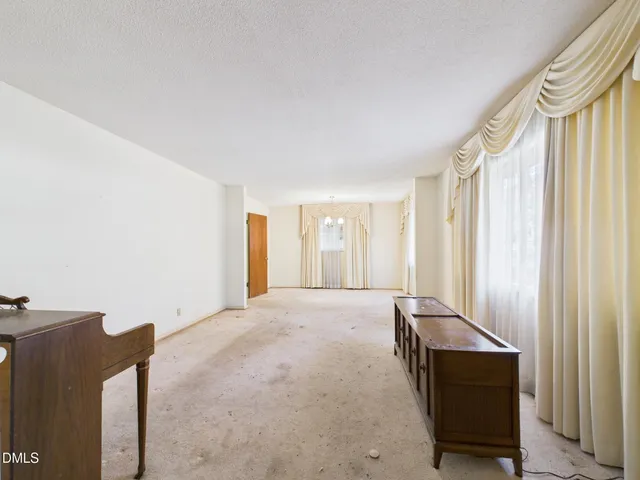 a kitchen with appliances cabinets and a sink