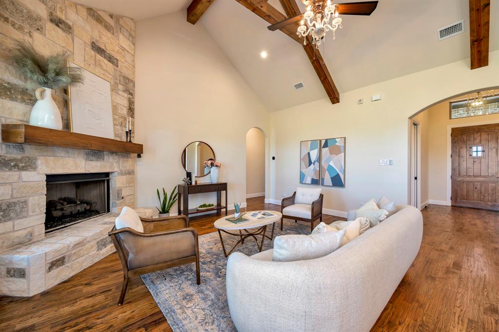 3800 Ridge Point Drive Northlake, TX 76226 - Photo 13 of 39 a living room with furniture and a fireplace