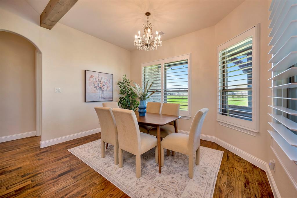 3800 Ridge Point Drive Northlake, TX 76226 - Photo 17 of 39 a view of a dining room with furniture window and wooden floor