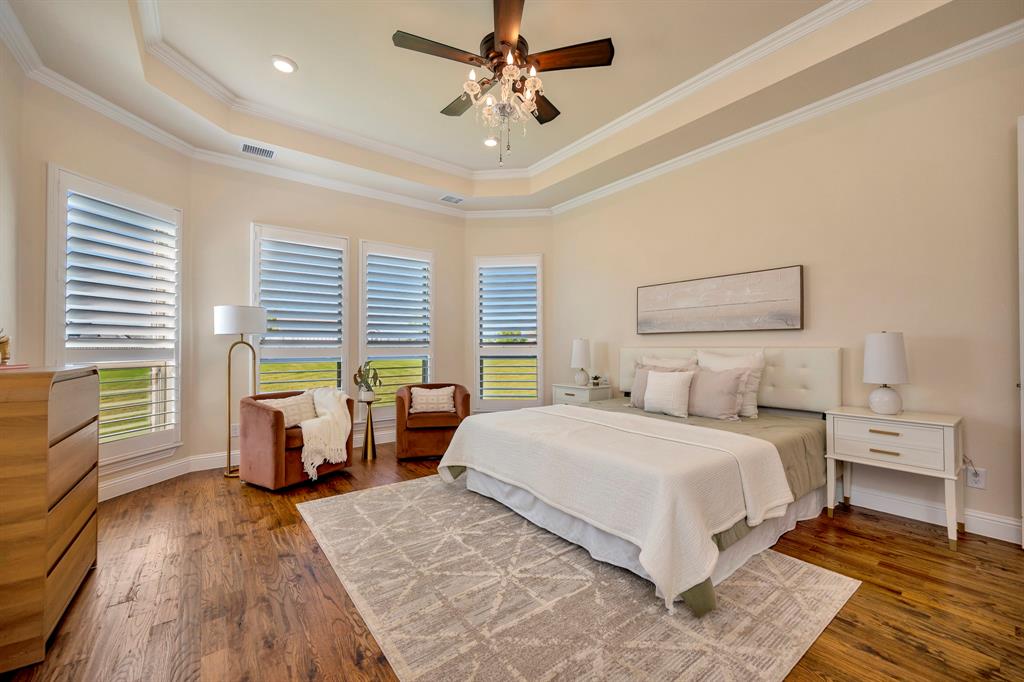 3800 Ridge Point Drive Northlake, TX 76226 - Photo 21 of 39 a bedroom with a large bed and two windows