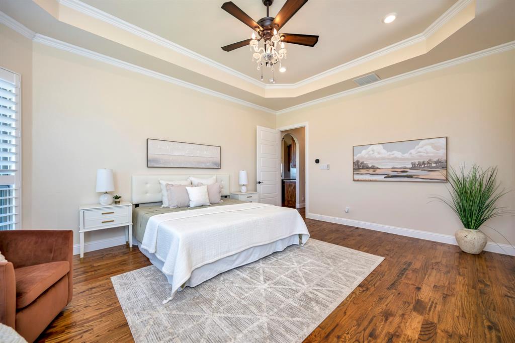 3800 Ridge Point Drive Northlake, TX 76226 - Photo 22 of 39 a bedroom with a large bed and a couch