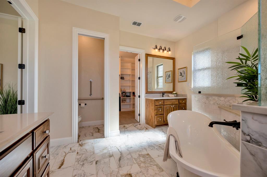 3800 Ridge Point Drive Northlake, TX 76226 - Photo 26 of 39 a spacious bathroom with a tub shower and sink