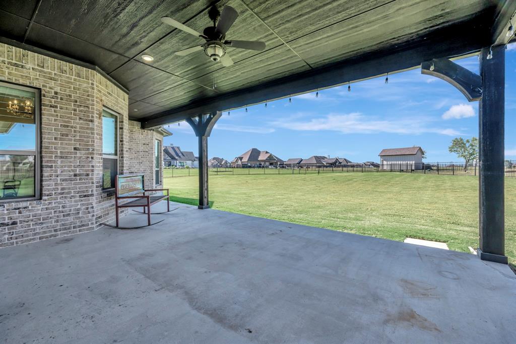 3800 Ridge Point Drive Northlake, TX 76226 - Photo 36 of 39 a view of a room with wooden floor and outdoor seating