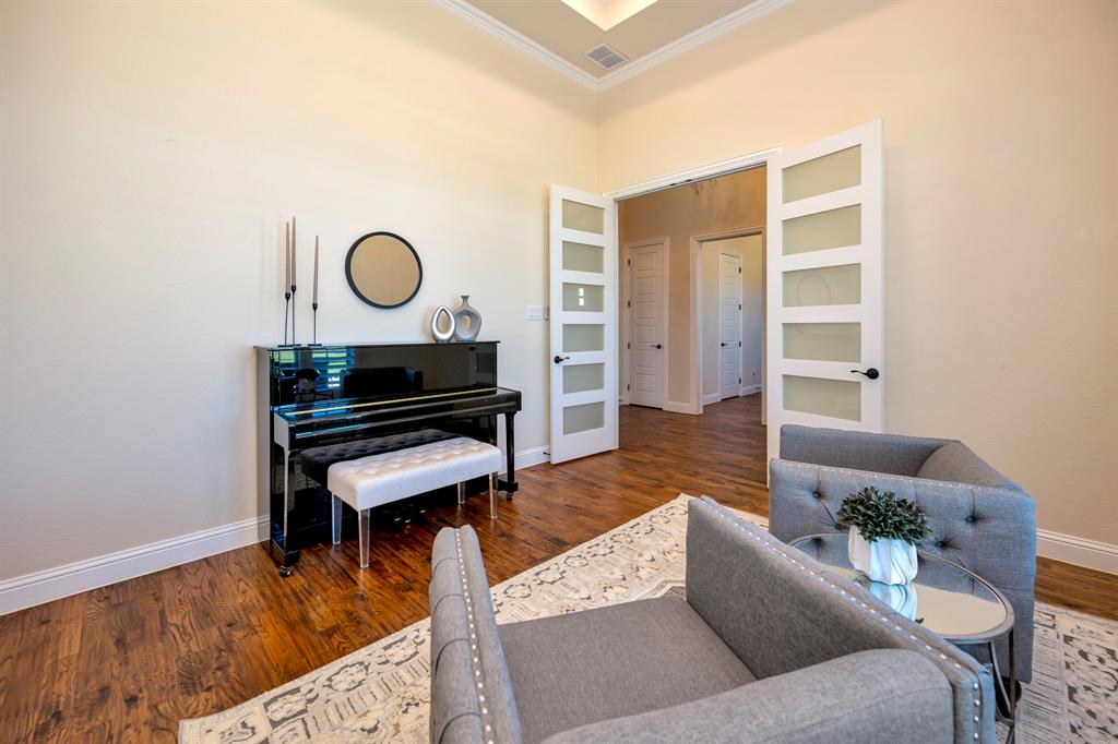 3800 Ridge Point Drive Northlake, TX 76226 - Photo 7 of 39 a living room with furniture and wooden floor
