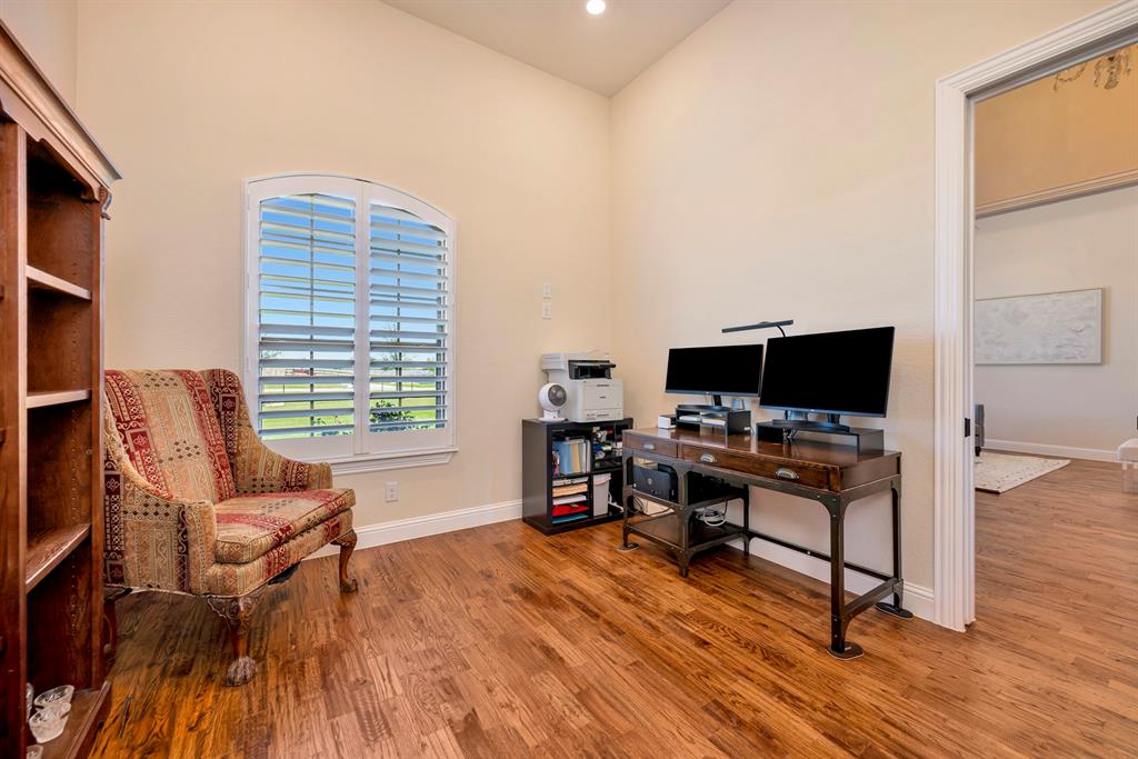 3800 Ridge Point Drive Northlake, TX 76226 - Photo 9 of 39 a living room with furniture and a flat screen tv