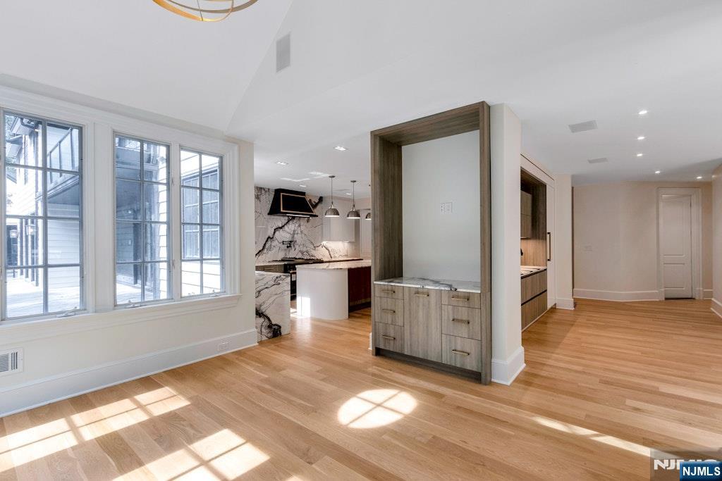 4 Duck Pond Road Alpine, NJ 07620 - Photo 11 of 35 a view of livingroom with furniture wooden floor and window