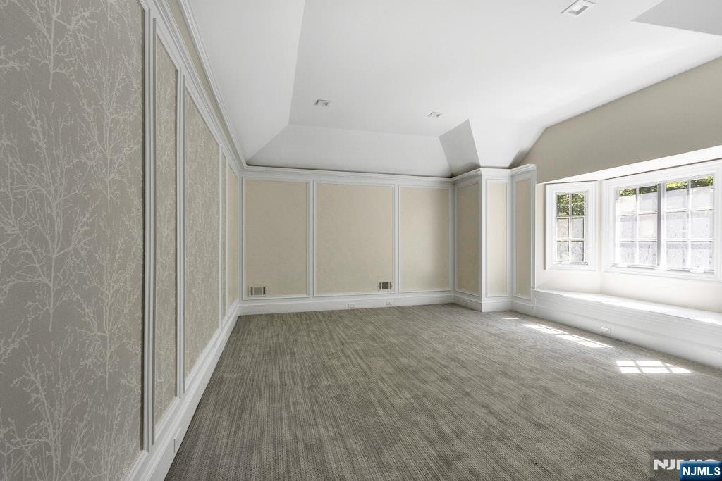 4 Duck Pond Road Alpine, NJ 07620 - Photo 23 of 35 a view of an empty room with wooden floor and a window