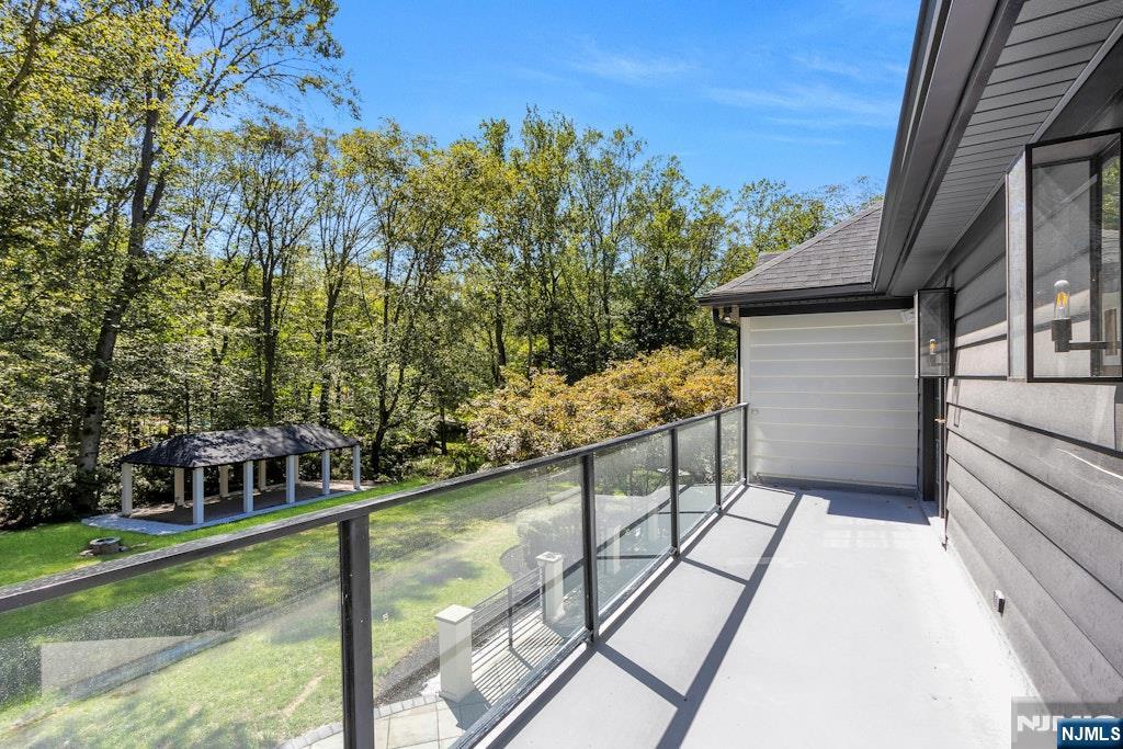 4 Duck Pond Road Alpine, NJ 07620 - Photo 27 of 35 a view of a balcony with mountain view