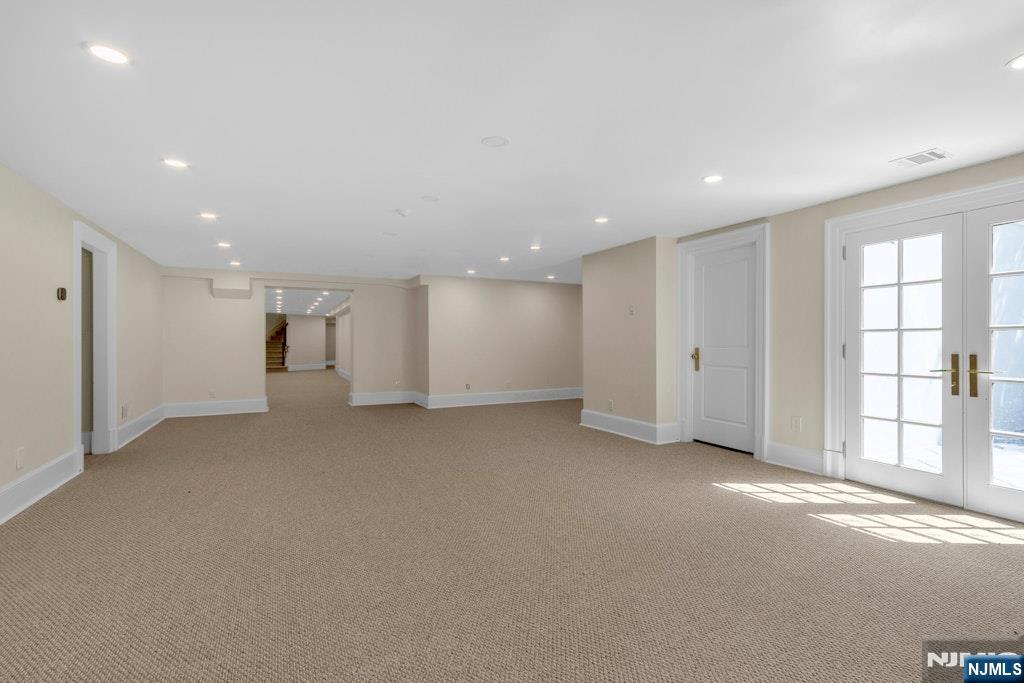 4 Duck Pond Road Alpine, NJ 07620 - Photo 32 of 35 a view of an empty room with a window