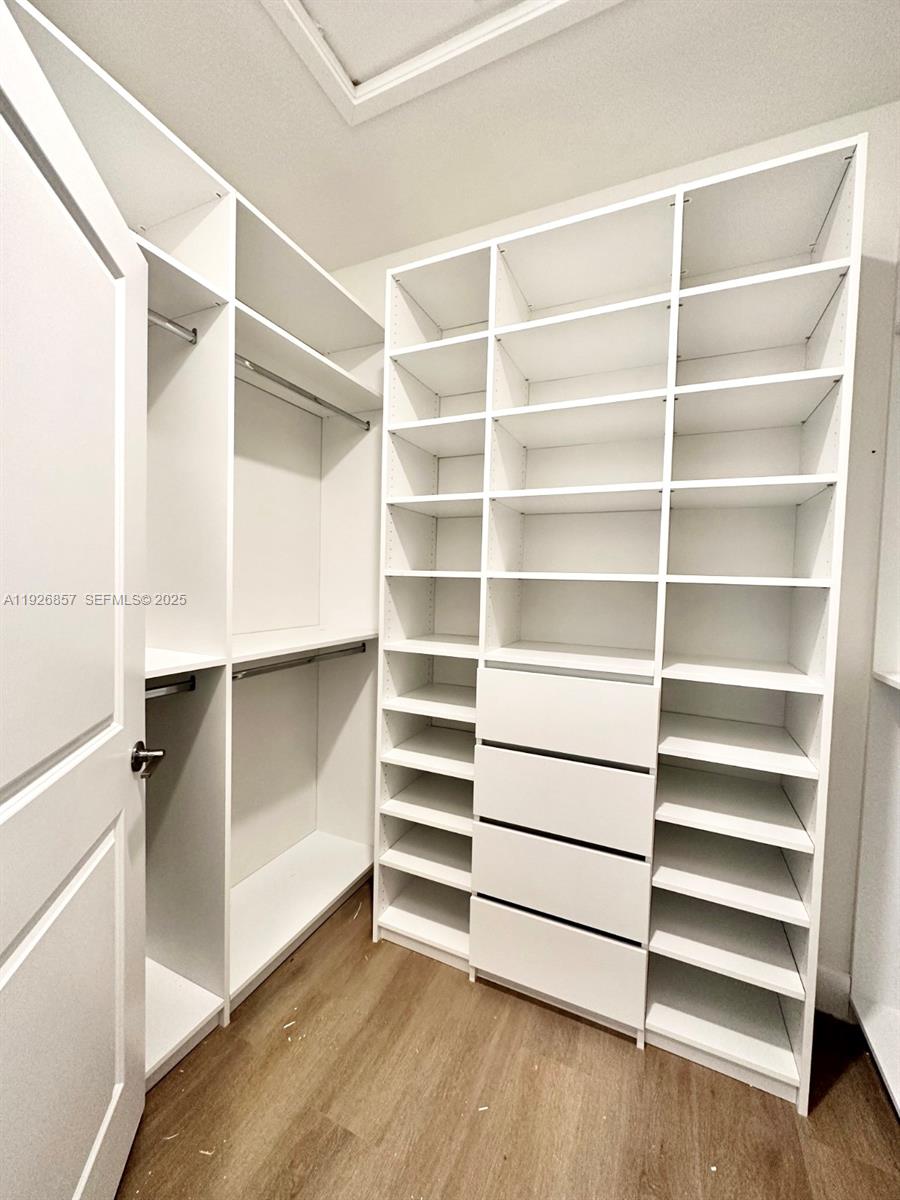 4276 Southwest 173rd Avenue Miramar, FL 33029 - Photo 37 of 58 a view of walk in closet with empty racks