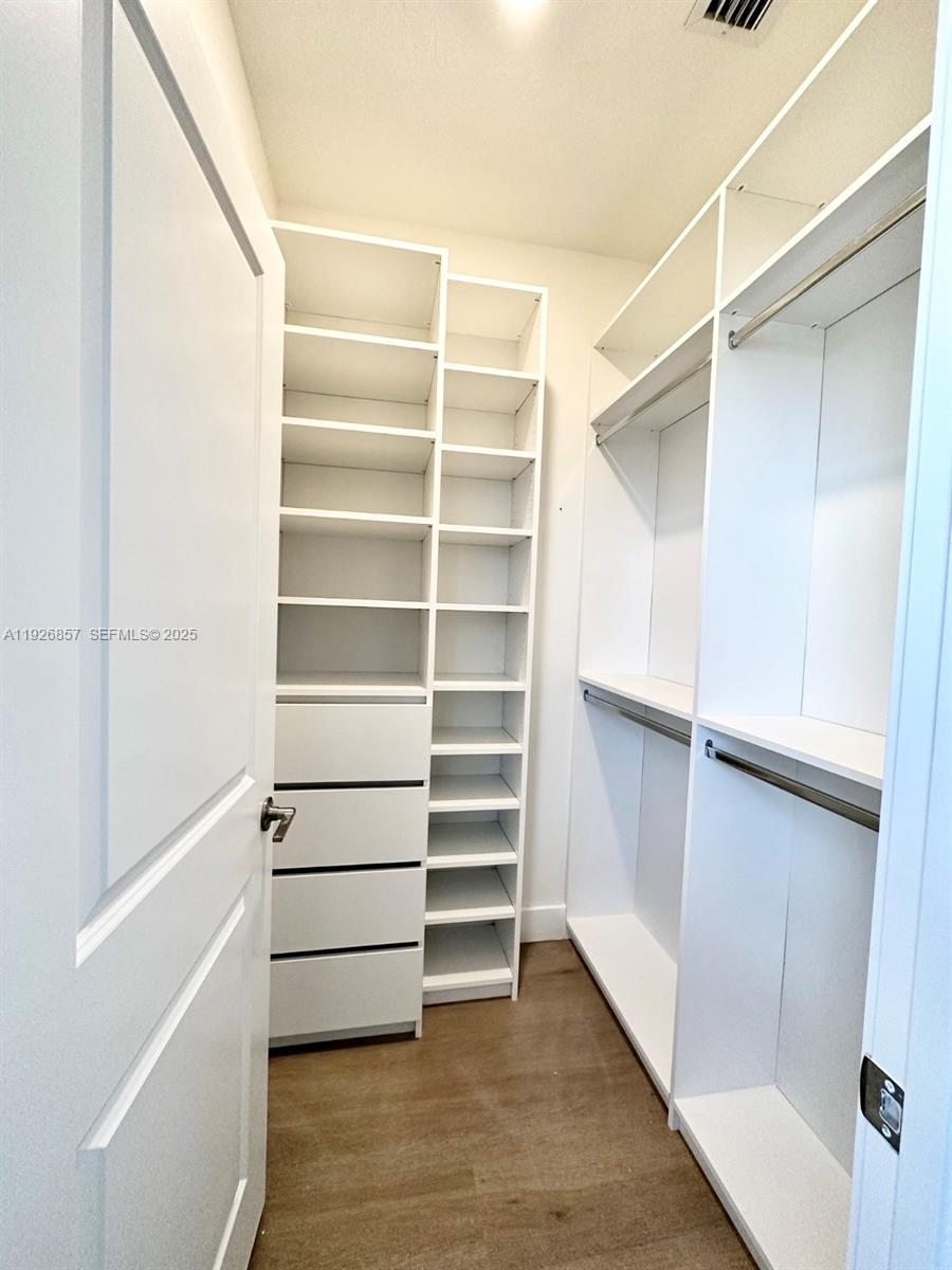 4276 Southwest 173rd Avenue Miramar, FL 33029 - Photo 44 of 58 a view of walk in closet with empty racks