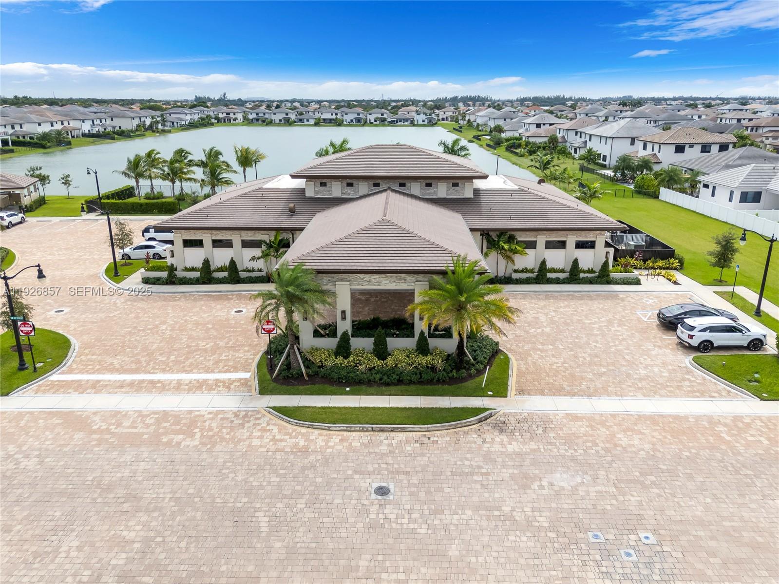 4276 Southwest 173rd Avenue Miramar, FL 33029 - Photo 53 of 58 an aerial view of a house with a garden and lake view