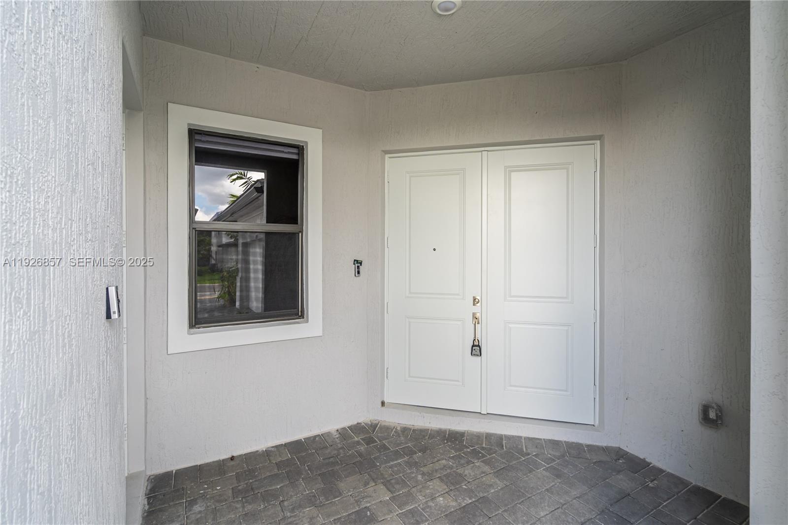 4276 Southwest 173rd Avenue Miramar, FL 33029 - Photo 8 of 58 a view of an empty room with closet and a window