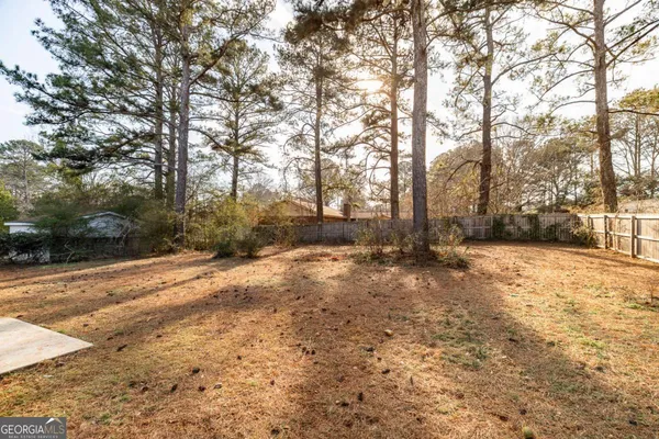 a view of street along with trees
