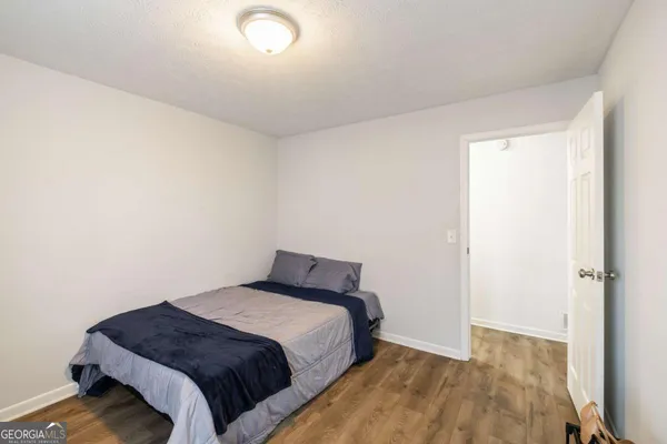 a bedroom with a bed and a cabinets