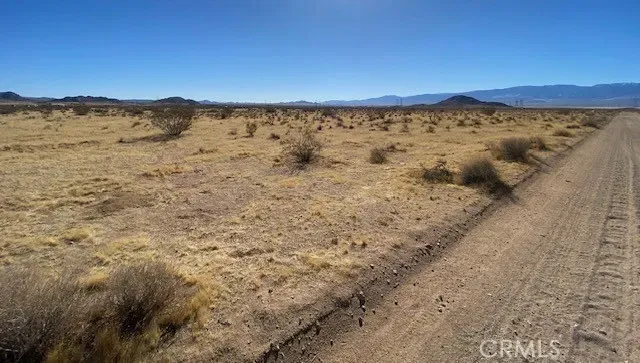 view of a bathroom with a shower and a mirror