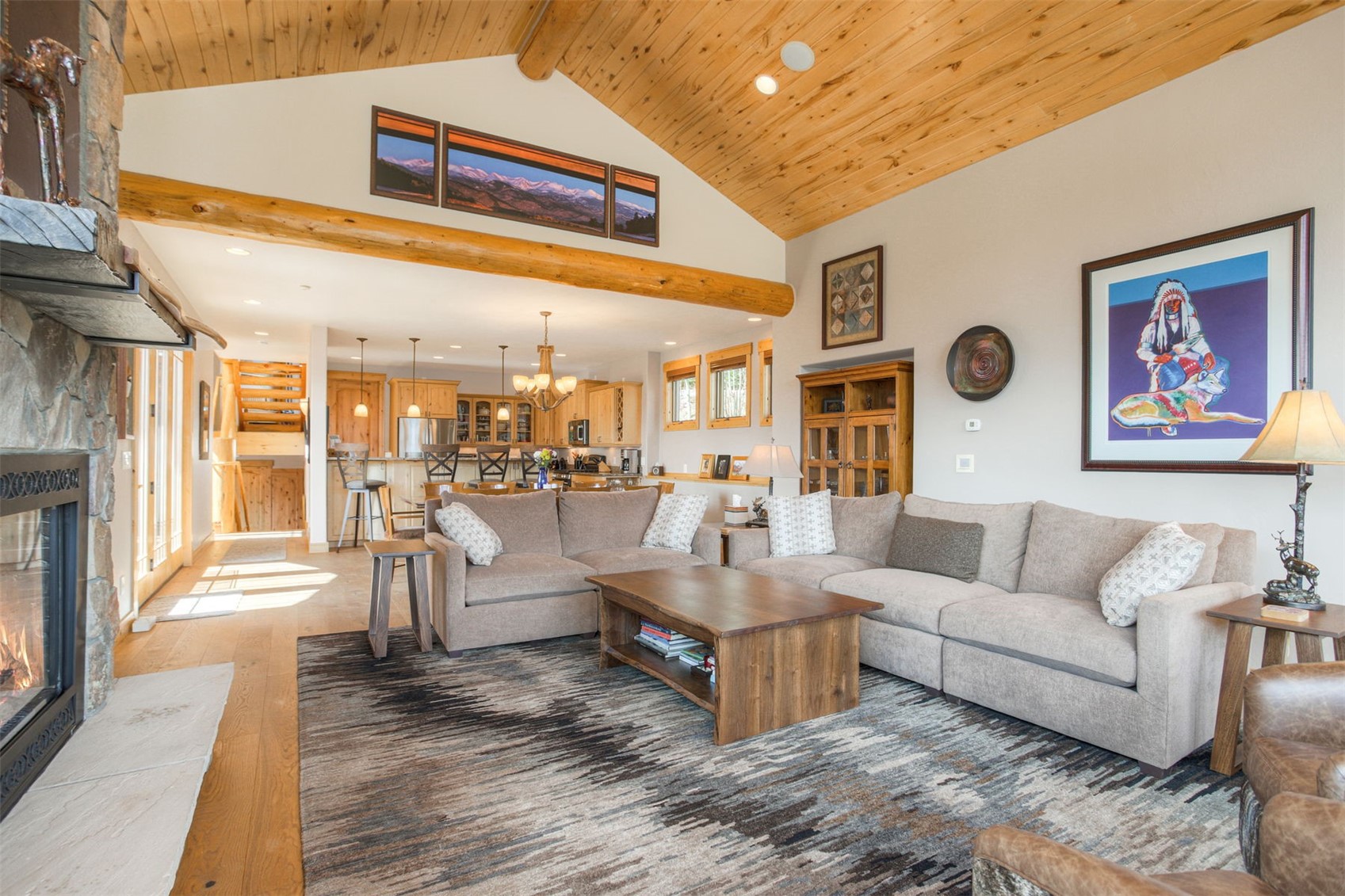 727 Willowbrook Road Silverthorne, CO 80498 - Photo 19 of 47 a living room with furniture and a fireplace